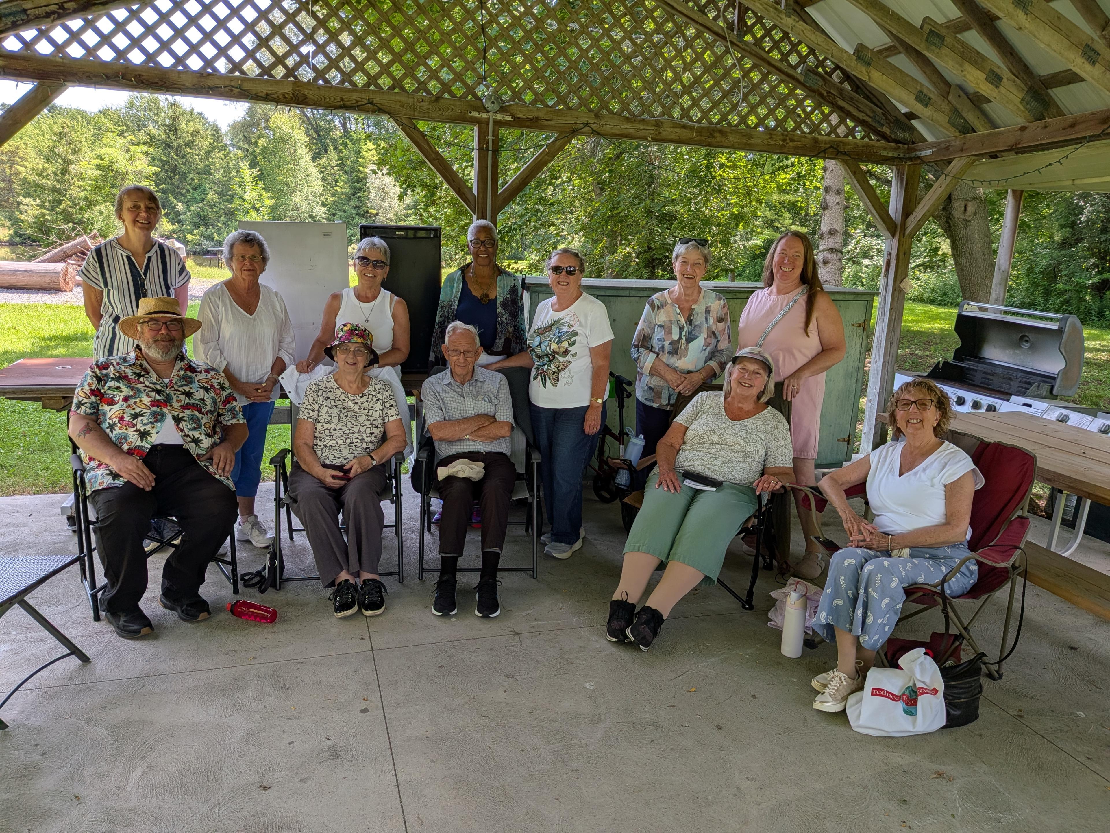 Members of St. John's Bible Study gathered together around a table